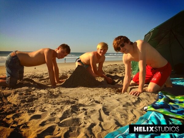 Cute Helix boys building sandcastles at Black’s Beach
